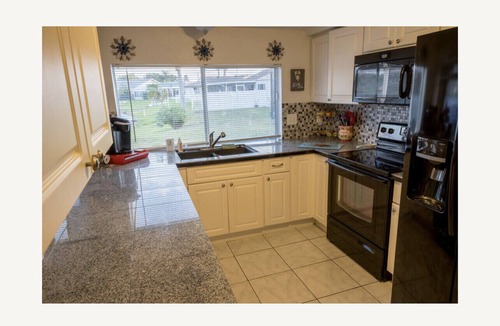 Holiday House | Florida Family Friendly, Waterfront Getaway Near Beaches and Parks!