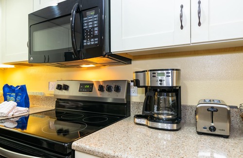 Holmes Beach House | Fountainhead Condo 3 2/2 Condo Steps To white Sugar Sand Beach, Large Pool