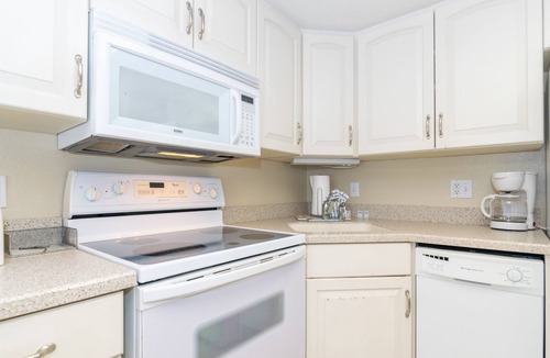 Holmes Beach House | Fountainhead Condo 4 2/2 Condo Steps To white Sugar Sand Beach, Large Pool