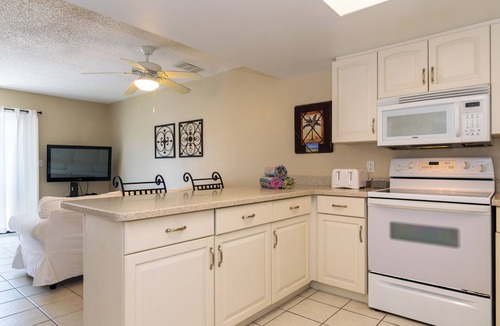 Holmes Beach House | Fountainhead Condo 4 2/2 Condo Steps To white Sugar Sand Beach, Large Pool