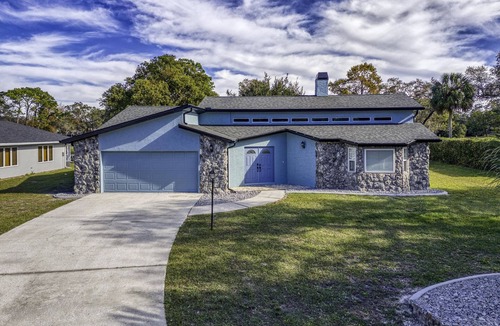 Spring Hill House | Four Beds, three baths, heated pool, and a Golf Course. What more do you need!