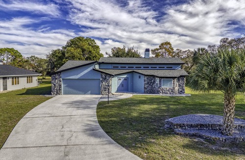 Spring Hill House | Four Beds, three baths, heated pool, and a Golf Course. What more do you need!