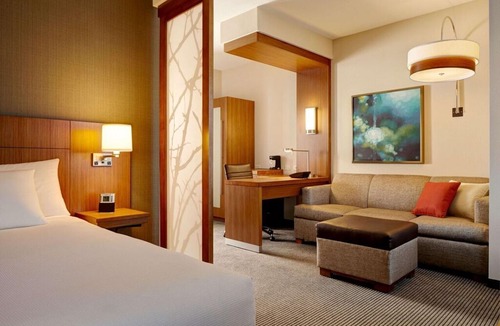 Interchange Square Hotel | Four Modern Units Near Attractions, Pool, Fitness Center