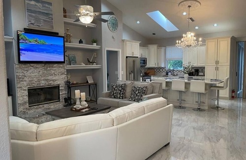 Golf and Sea Village of Apollo Beach House | Free heated pool at Apollo Beach gazebo grill pool table games