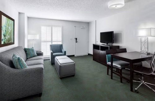 Florida Central Atlantic Coast Hotel | Fun-Filled Resort Getaway l 4 Spacious Suites + Free Breakfast & Park Shuttle