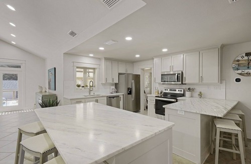 Gulf Pines House | Fun in the Sun - Vacation Home with Private Pool, Pickleball Court & Includes Golf Cart