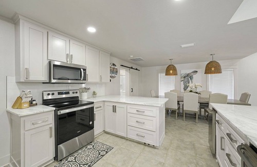Gulf Pines House | Fun in the Sun - Vacation Home with Private Pool, Pickleball Court & Includes Golf Cart