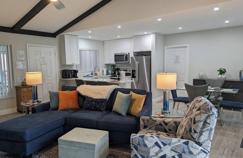 Coral Ridge House | Fun-tastic Oasis! Shared Heated Pool n Spa! Beach 1.4 mi! Walkable Food n Fun!