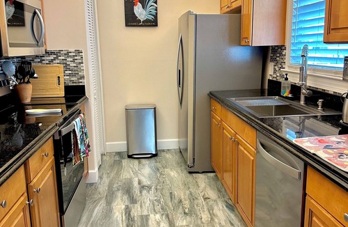 Key West House | Funky Chicken Cottage with shared pool, 3 bed 3 bath minutes from Key West