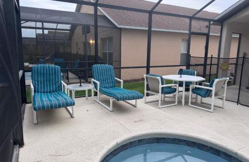 Kissimmee House | Gated 4BR Pool Home, 20 min-Disney, 30 min-Epic Universe, Sleeps 12