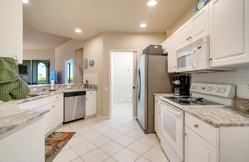 Tropical Cove Condo | Golden Hour Getaway at Lexington CC Lake Village