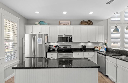 Laurel Grove House | Golf Course Beach Cottage with 2 Golf Carts! Near Beach, Pool, Hot tub, Tram.