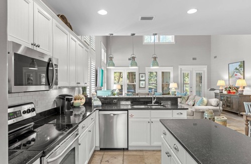Laurel Grove House | Golf Course Beach Cottage with 2 Golf Carts! Near Beach, Pool, Hot tub, Tram.