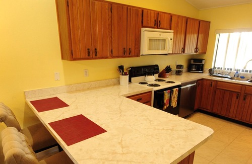 Lake Wales Condo | Golf course, pool, hot tub, and tennis courts: Lake Wales Country Club oasis
