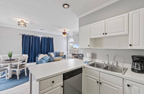 Central Myrtle Beach Apartment | Golfers' Getaway w/pool, patio, grills, kitchen