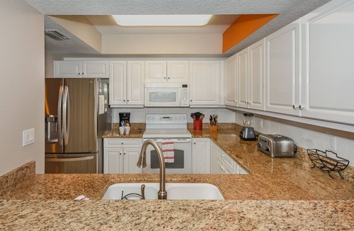 New Smyrna Beach Condo | Gorgeous Coastal Themed Condo with Views of the Estuary! OW10-303