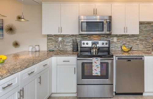 New Smyrna Beach Condo | Gorgeous Oceanfront Condo-Walk to Flagler-Updated Beachy Chic-Best NSB Location!