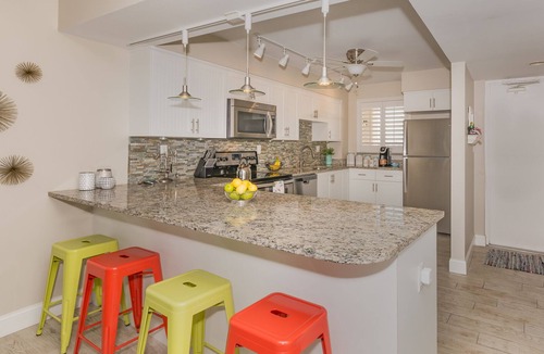 New Smyrna Beach Condo | Gorgeous Oceanfront Condo-Walk to Flagler-Updated Beachy Chic-Best NSB Location!