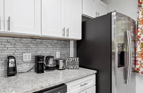 East Point House | Grand Five-Bedroom Retreat Close to the Airport
