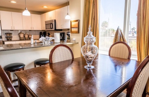 Panama City Beach Condo | GRAND PANAMA BEACHFRONT, 1st FLR DIRECT TO BEACH, PET-FRIENDLY. NEXT TO TIKI BAR