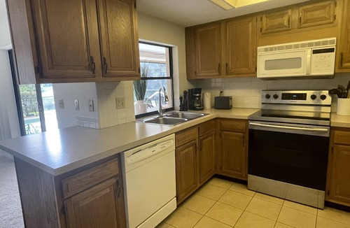 East Naples House | Great family home with a new sparkling pool,lovely lake view, 5 Minutes to beach