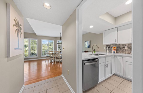 Spinnaker Beachhouses Villa | Great Spinnaker! Quiet Location w/Golf/Lagoon Views! Amenity access included!
