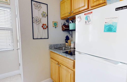 Redington Beach Condo | Great Value! Steps to Beach - Large Patio Area ~ Heated Pool ~ Free Parking - Ground Floor Condo