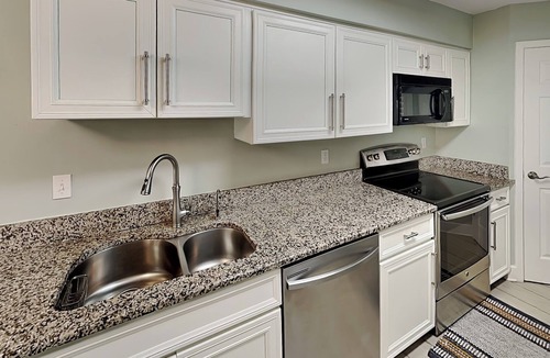 Butler Beach Condo | Ground Floor Condo w. Patio, Community Pools + Beach Access