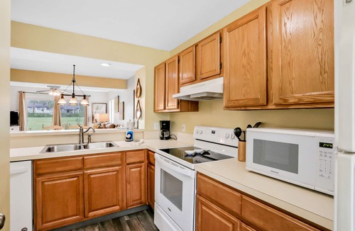 Butler Beach Condo | Ground-floor condo next to the tennis courts with 2 pools, sauna, beach access