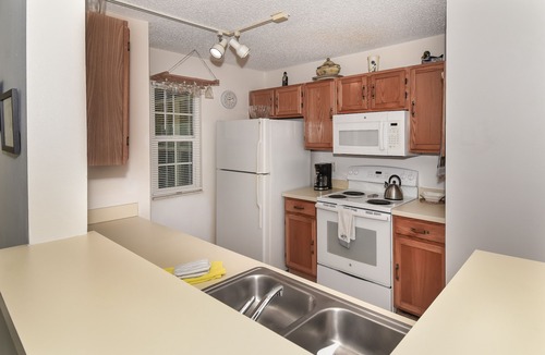 New Smyrna Beach Condo | Ground floor Sun Beach Club - Walking distance to car free beach. SBC884