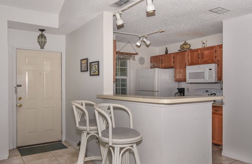 New Smyrna Beach Condo | Ground floor Sun Beach Club - Walking distance to car free beach. SBC884