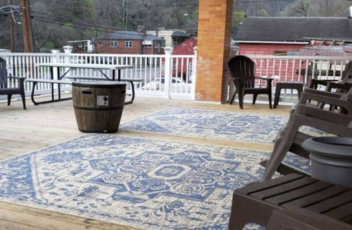 Kyle House | Guistina's is the second story unit with a huge porch that overlooks Northfork.