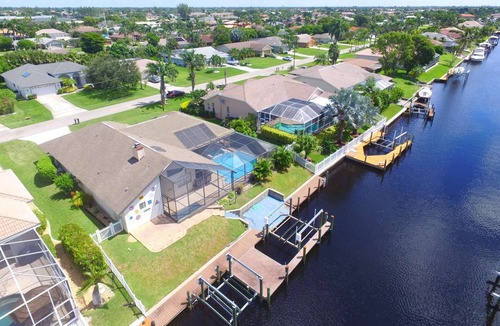 Pelican House | Gulf Access Canal, SW Cape Coral Heated Pool Home! Bikes & Over $125 of Free Daily Activities!