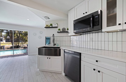 Biggar House | Gulf Access, Excellent location, Solar heated pool, Modernized Beautiful Home!