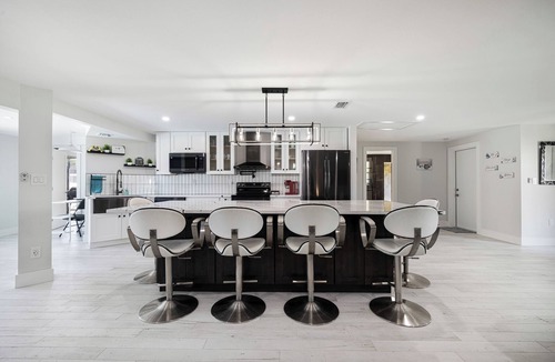 Biggar House | Gulf Access, Excellent location, Solar heated pool, Modernized Beautiful Home!