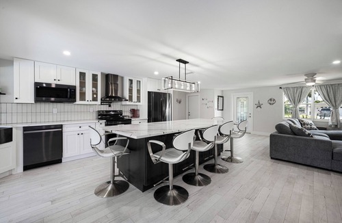 Biggar House | Gulf Access, Excellent location, Solar heated pool, Modernized Beautiful Home!