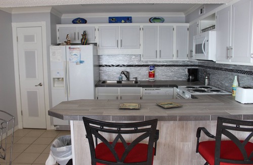 Fort Walton Beach Condo | Gulf Front, Top Floor End Unit with Front & Side View of Gulf