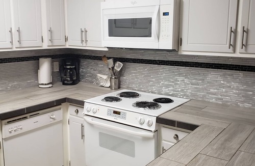 Fort Walton Beach Condo | Gulf Front, Top Floor End Unit with Front & Side View of Gulf