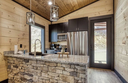 Gatlinburg - Pigeon Forge Ski Chalet | Header: Whiskey Splash | Indoor Pool · Hot Tub · 75-Ft Waterfall · Sleeps 10