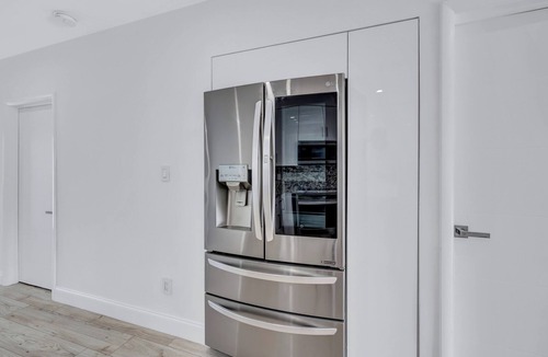 North Central Hollywood House | HEATED Pool Home on Lake Hard Rock Guitar Hotel Beach Airport
