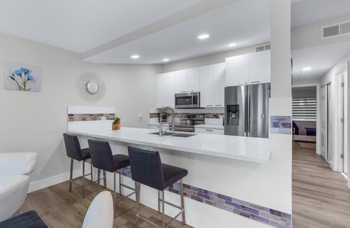 Coral Ridge Apartment | Heated Pool + Outdoor Patio + 3MI to Beach!