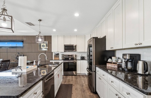 Holiday Beach House | Heated Pool & Pet Friendly | Minutes To Beach | Spacious Backyard | FLPCB38