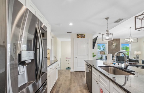 Holiday Beach House | Heated Pool & Pet Friendly | Minutes To Beach | Spacious Backyard | FLPCB38