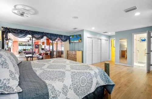 Palm River Estates House | HeatedPool, GameRoom, Pool Table & Darts, Fenced Yard