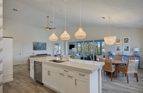 Bright Water House | Heavenly Palms- New Construction Pool Home with 10 minute walk to the Beach!