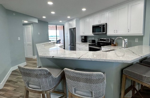 Sand Key Condo | High End, Sky High Views- Completely Remodeled on Sand Key