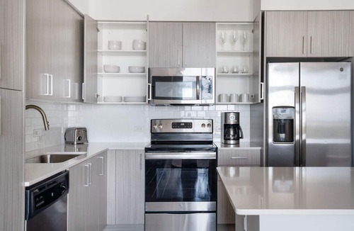 Poinciana Park Apartment | Hip Ponciana Park 1BR w/Gym, W/D & Pool, steps to WF, by Blueground