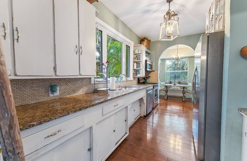Valencia Terrace House | Historic 1920's spanish-style home just off Palm tree lined McGregor Blvd