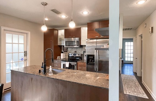 Dixieland House | Historic District cottage near it all with dog-friendly yard & screened porch