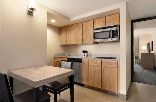 Spruce Hill Hotel | Historic Philly: Stylish Suites with Full Kitchens, Pool Access & Free Parking!